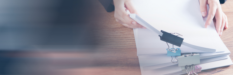 Academic Misconduct Banner Person looking at a legal file